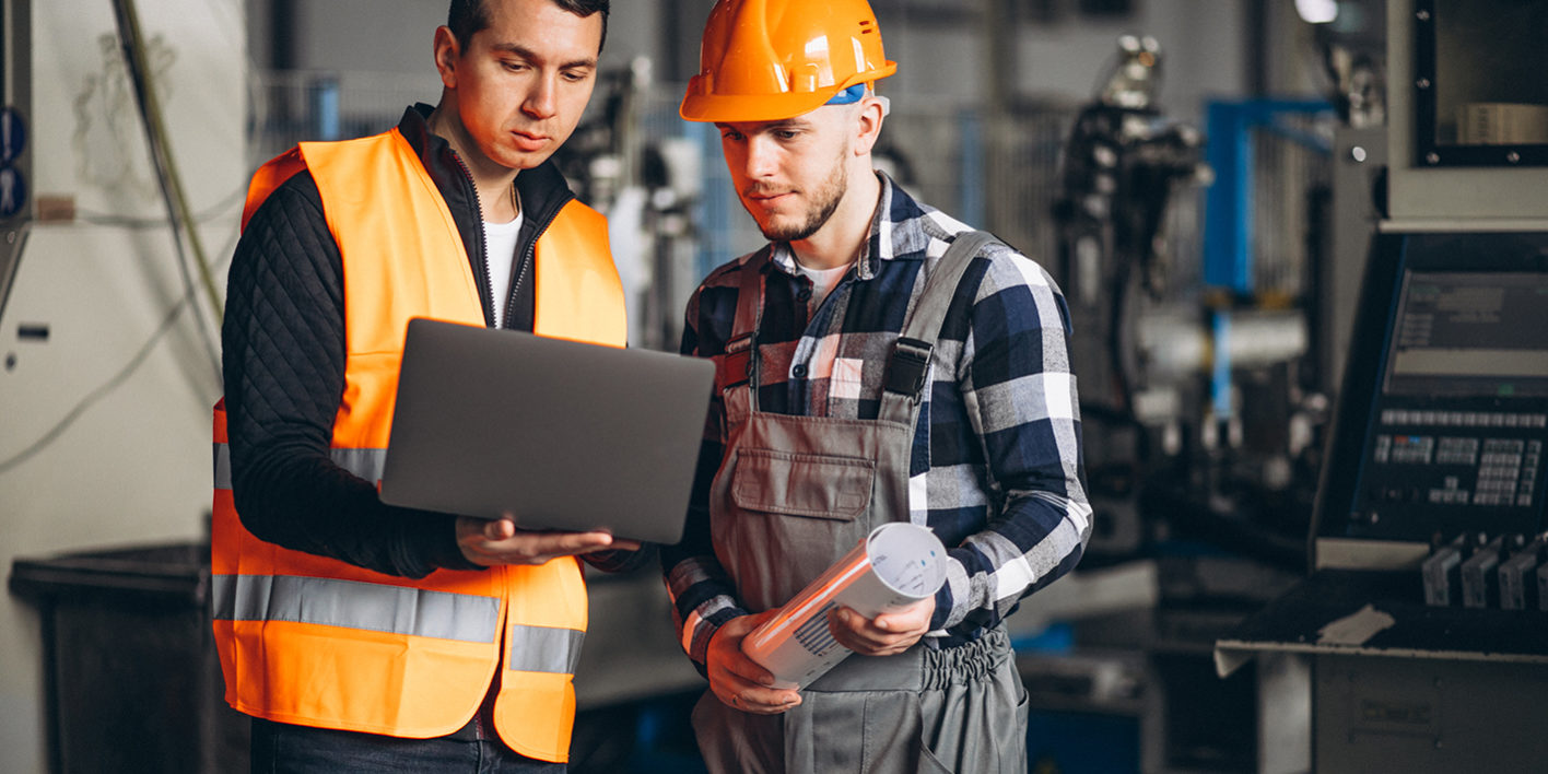Two colleagues at a factory