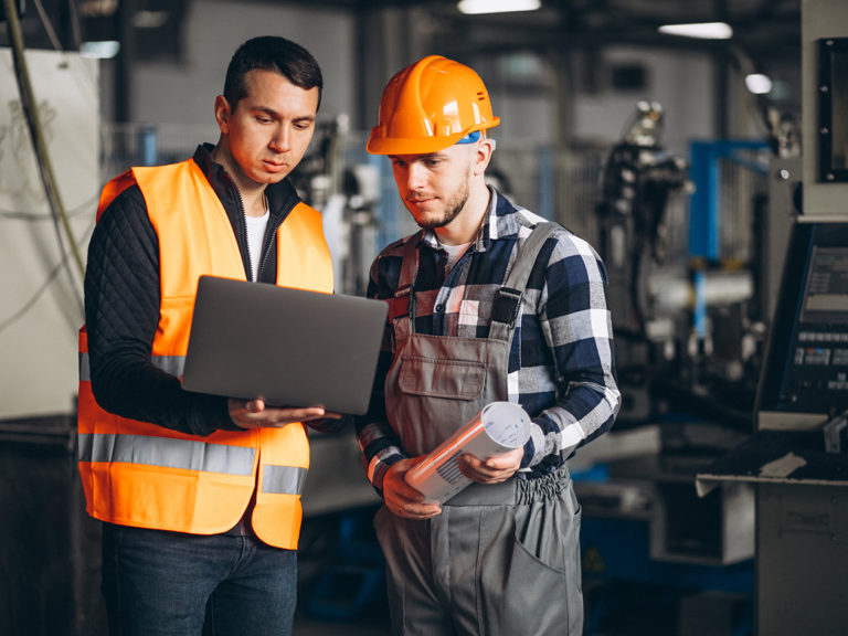 Two colleagues at a factory